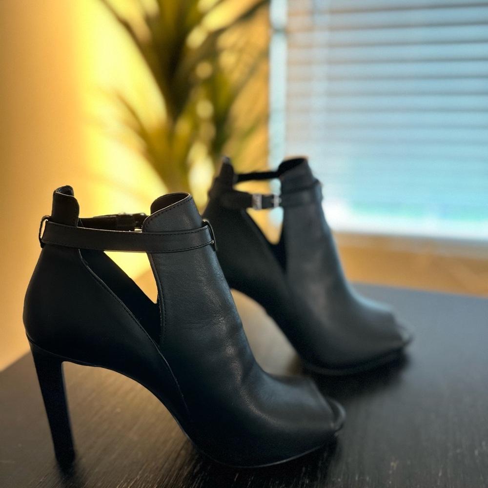 Michael Kors Black Ankle Boots with Modern Cut-Out Design